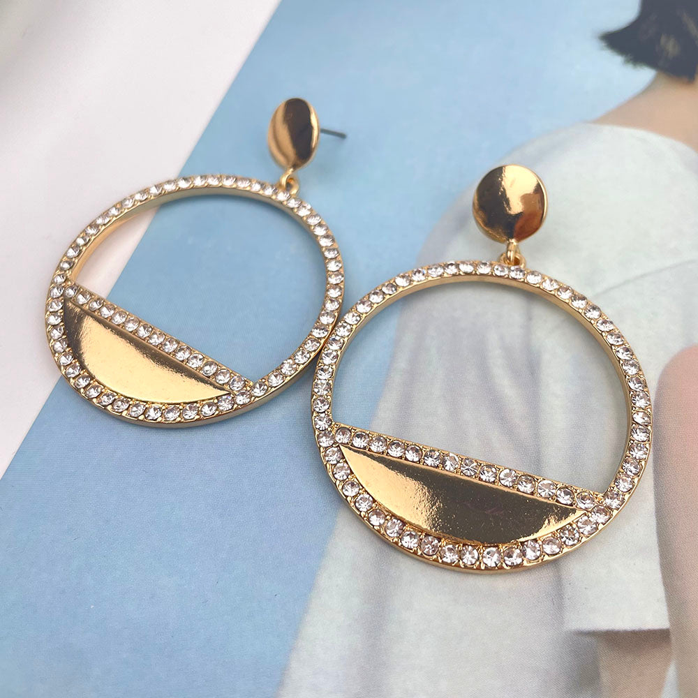 STATEMENT ROUND EARRINGS